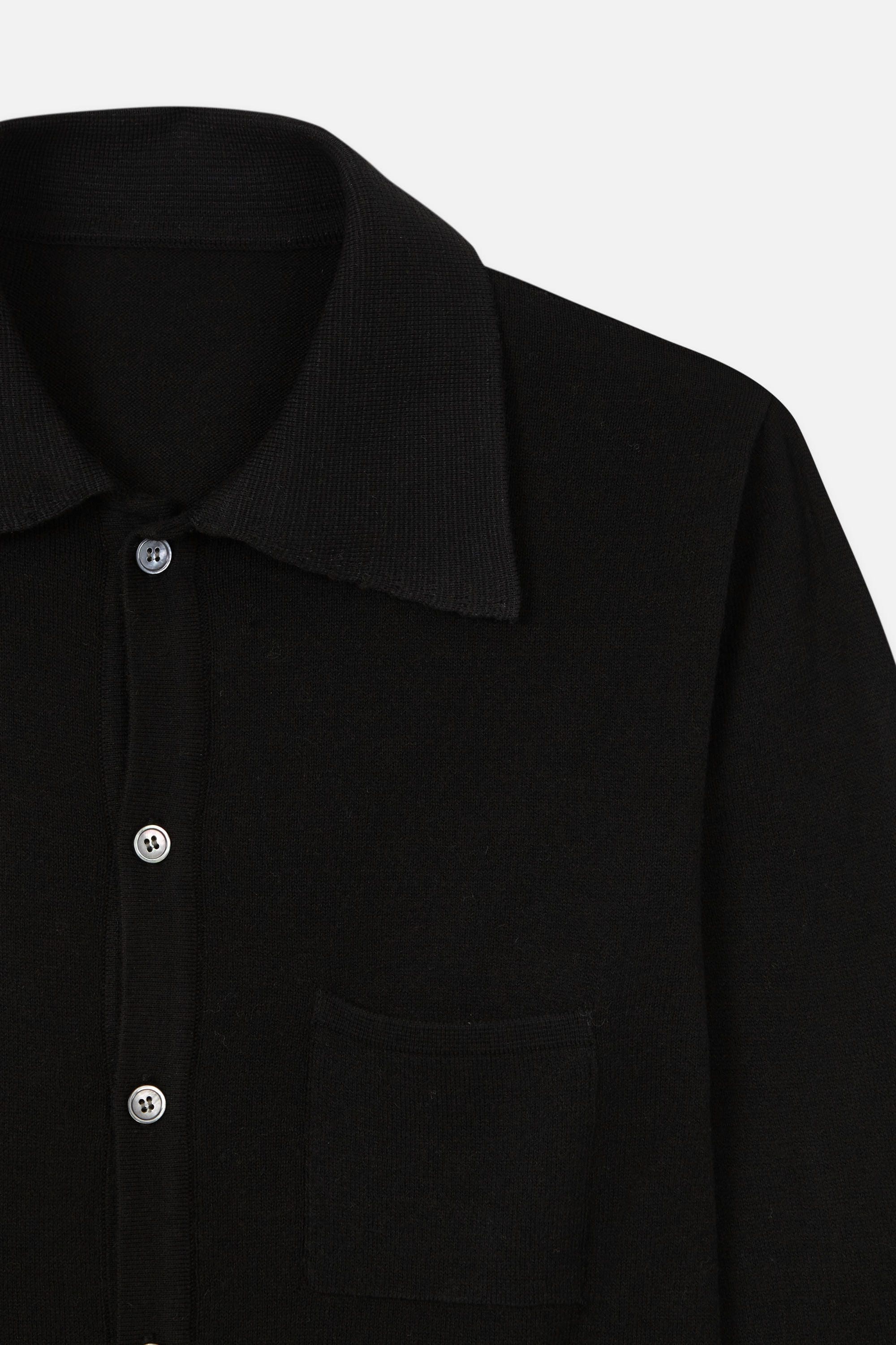 black knitted shirt